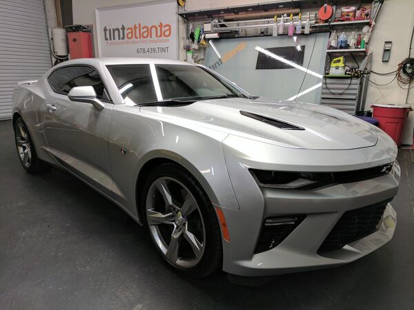 Silver Chevrolet Camaro SS with dark window tint installation Woodstock